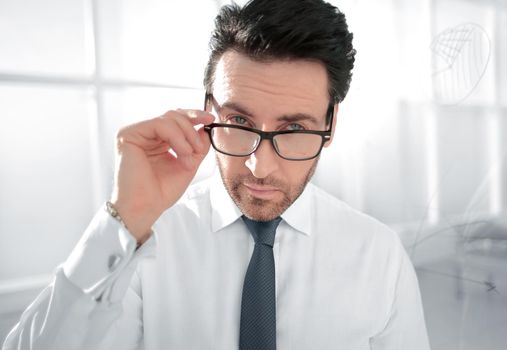 attentive businessman standing in the office.business people