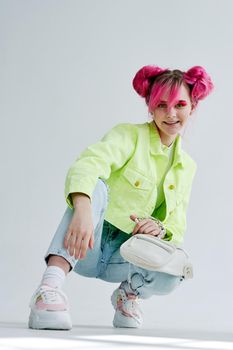 cheerful woman pink hair posing fashion clothes lifestyle fun design. High quality photo