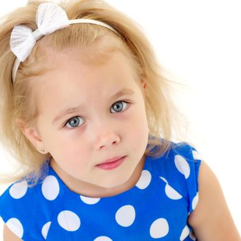 Beautiful little girl close-up. The concept of beauty and fashion, happy childhood. Isolated on white background.