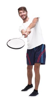 in full growth. a young man with a tennis racket. isolated on white background