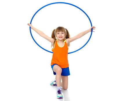 A nice little girl is performing gymnastic exercises. Concept of a healthy lifestyle, sport and fitness. Isolated on white background.