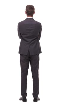 rear view . confident businessman.isolated on white background