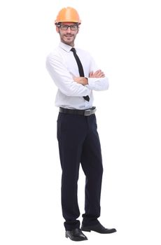 side view. young business man in a protective helmet.isolated on white background.