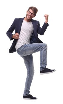 in full growth.dancing happy business man .isolated on white background.