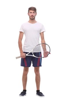 in full growth. a young man with a tennis racket. isolated on white background