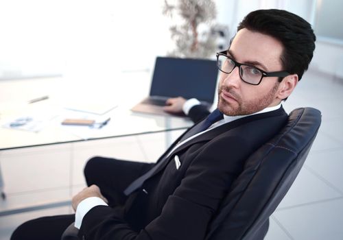 responsible businessman sitting at his Desk.business people