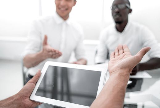 close up.business team using a digital tablet in the office.people and technology .