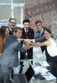 reliable business team standing in the office.the concept of teamwork