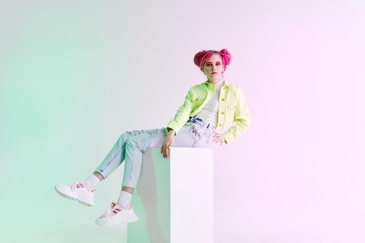 fashionable woman pink hair posing fashion clothes Acid style design. High quality photo