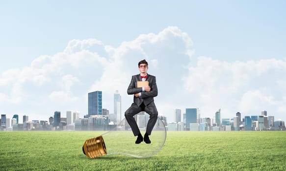 young businessman with a book. Concept of Creativity in Business