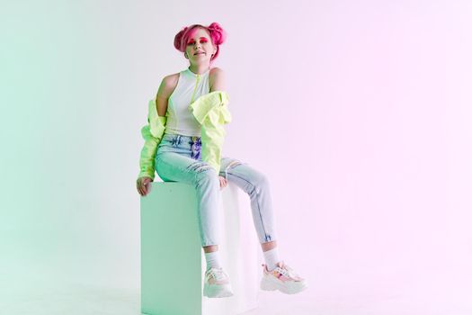 girl with pink hair teen posing fashion neon. High quality photo