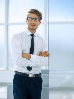 close up.young employee standing in the office.business people