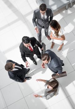 top view.a group of business people standing on a marble floor. business concept