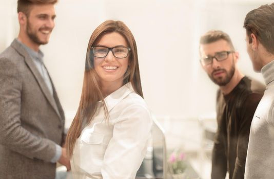 close up.employees standing in the office.business concept