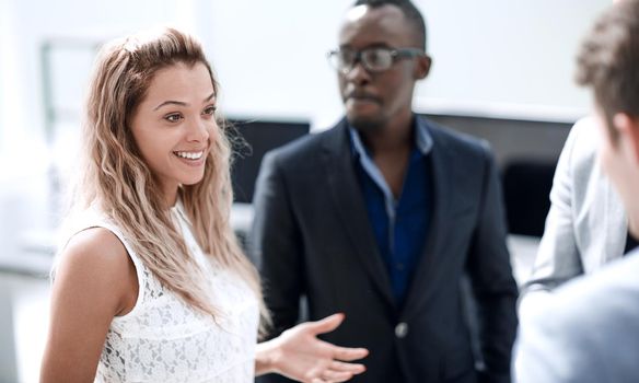 young business woman on the background of colleagues.business concept
