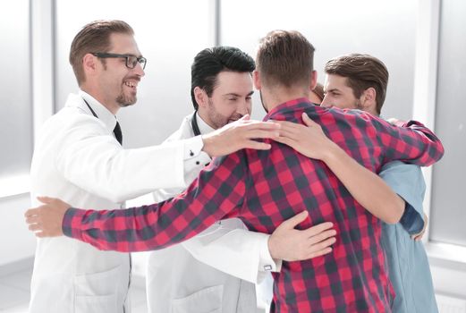 group of professional medical team with a close-up patient