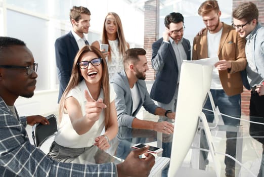 business team is preparing a new presentation.the concept of teamwork