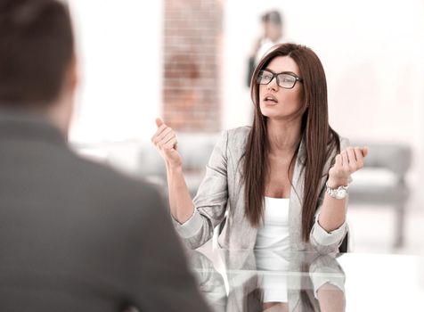 business woman explaining to the client the terms of the contract.business concept