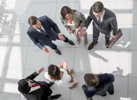 top view. employees discussing important issues. photo with text space