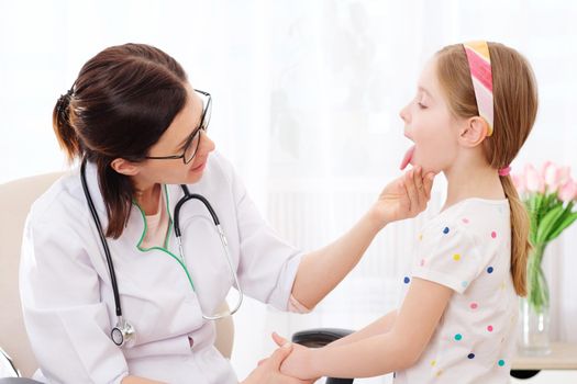Doctor-physician checking pretty little girls glands