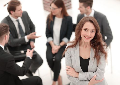 business woman with her staff, people group in background at modern bright office indoors