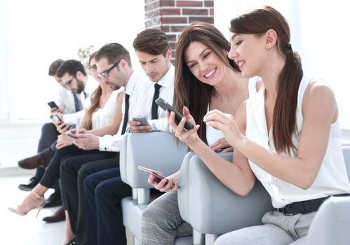 young employees of the company using their gadgets.photo with copy space