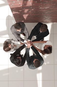 Top view of business people with their hands together in a circle.photo with copy space