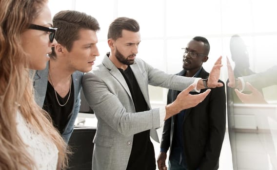 close up.businessman holds a presentation of a new project. photo with copy space