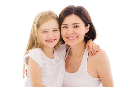 Mother with her little daughter girl isolated on a white background