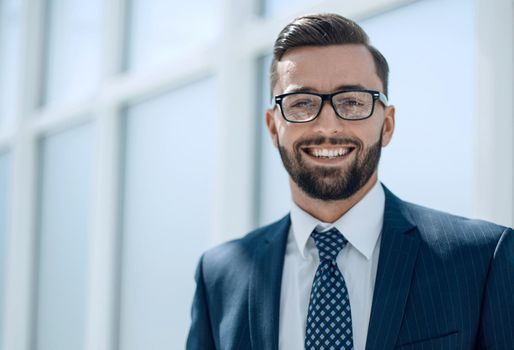 successful businessman standing on a light background.photo with copy space