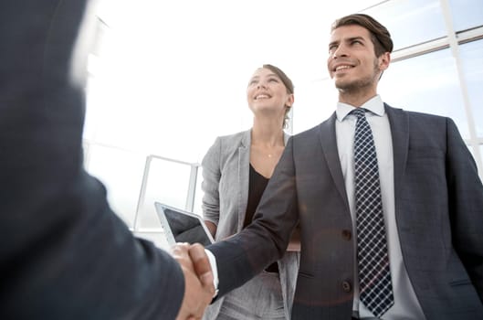 close up.business people shaking hands.concept of partnership