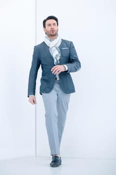 full height.confident business man.isolated on light background