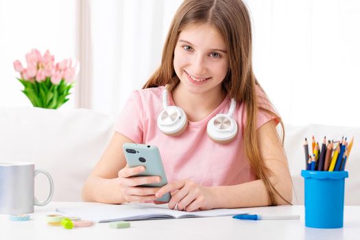 Cute girl spending leisure time chatting with friends