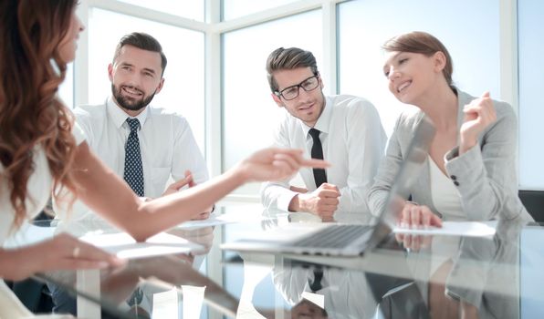 smiling business team at the Desk. office weekdays