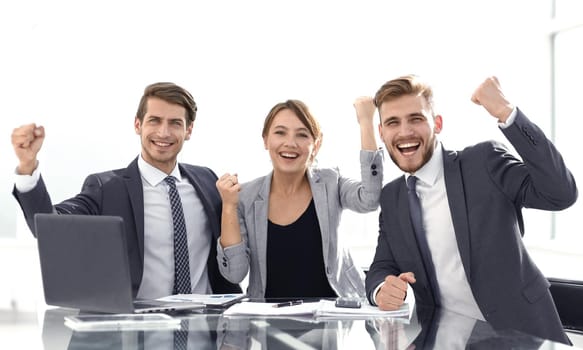 successful business team sitting at the Desk.photo with copy space