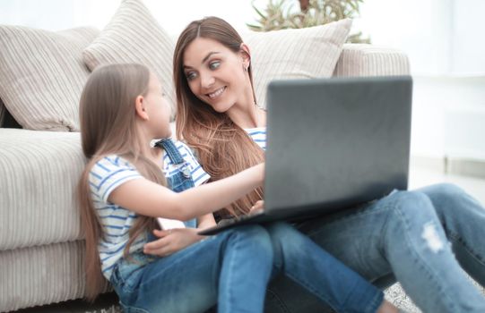 mother and daughter spend their free time together.people and technology