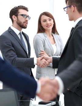 partnership business handshake in officce