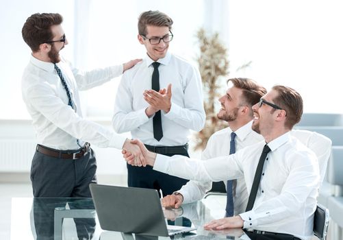 handshake business colleagues in the workplace.photo with copy space