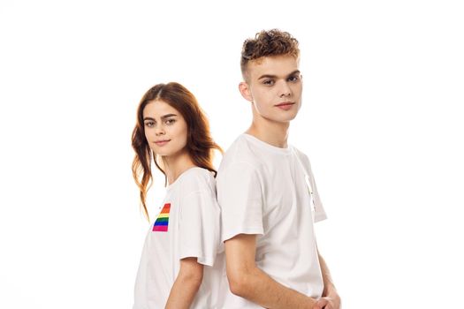 young couple lgbt Flag transgender lifestyle light background. High quality photo