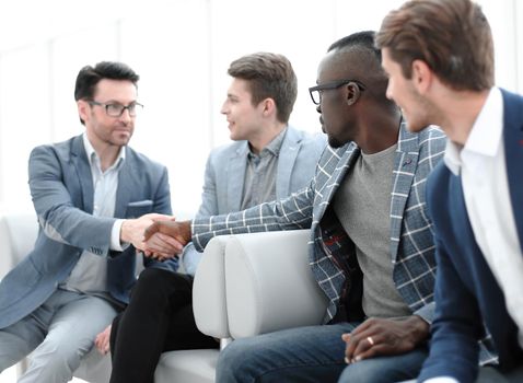 business colleagues reaching out for a handshake.the concept of solidarity