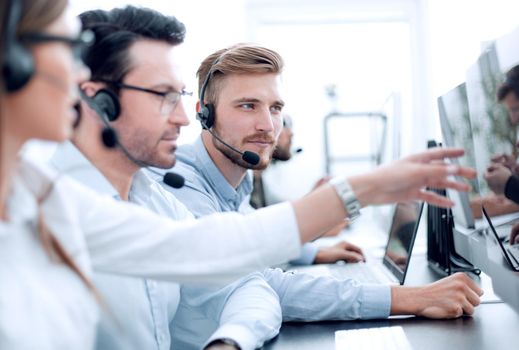 close up.call center staff discuss the information received