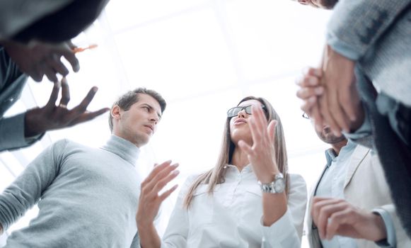 bottom view.business woman discusses with the business team new ideas.photo with copy space
