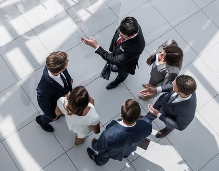 top view. employees standing in a modern office. photo with text space