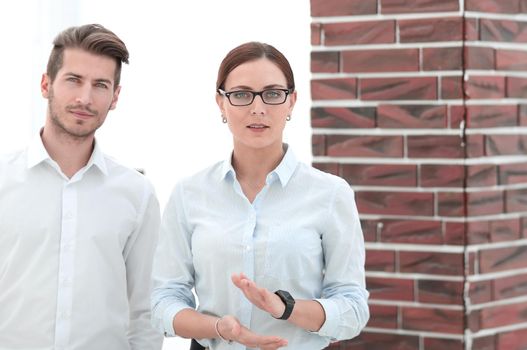 business couple standing in the office .photo with copy space