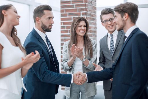 business team applauds its leaders. the concept of cooperation