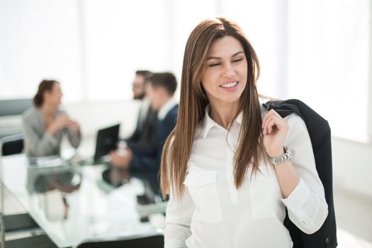 successful business woman on the background of the office.photo with copy space