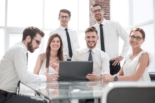 successful business team at the Desk in the office.the concept of teamwork