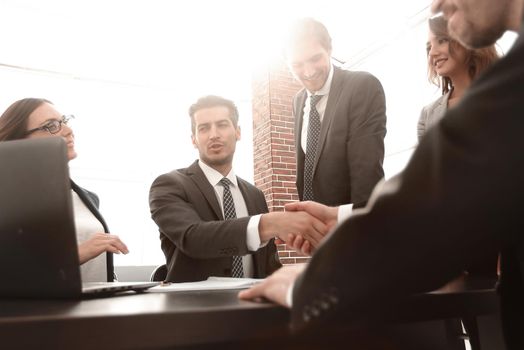 Business people shaking hands, finishing up a meeting