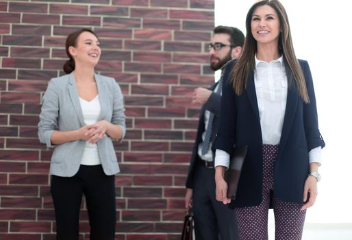 young business woman on the background of the office.photo with copy space