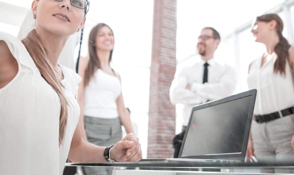 confident business woman sitting at her Desk.photo with copy space